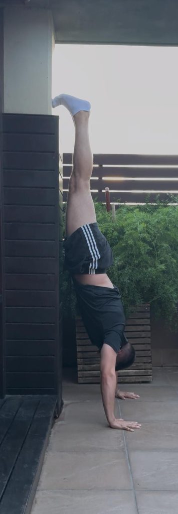 chest to wall handstand